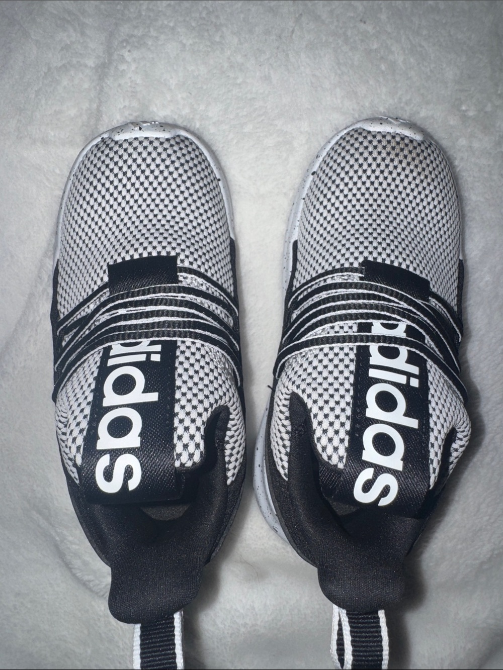 adidas Black and White Stretch Knit Slip-On Sneakers
